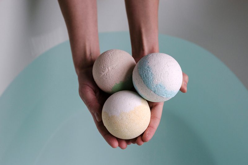 person holding homemade bath bombs