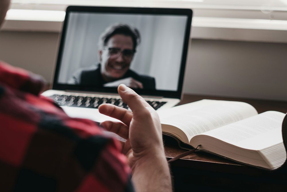 person talking during a video meeting