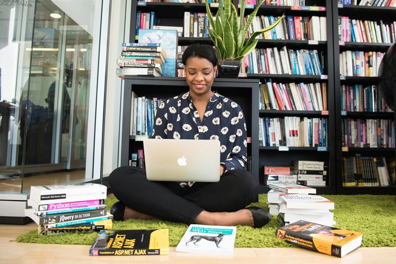 student working in library