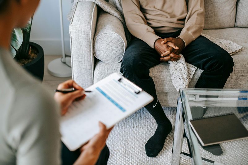 patient speaking with counselor