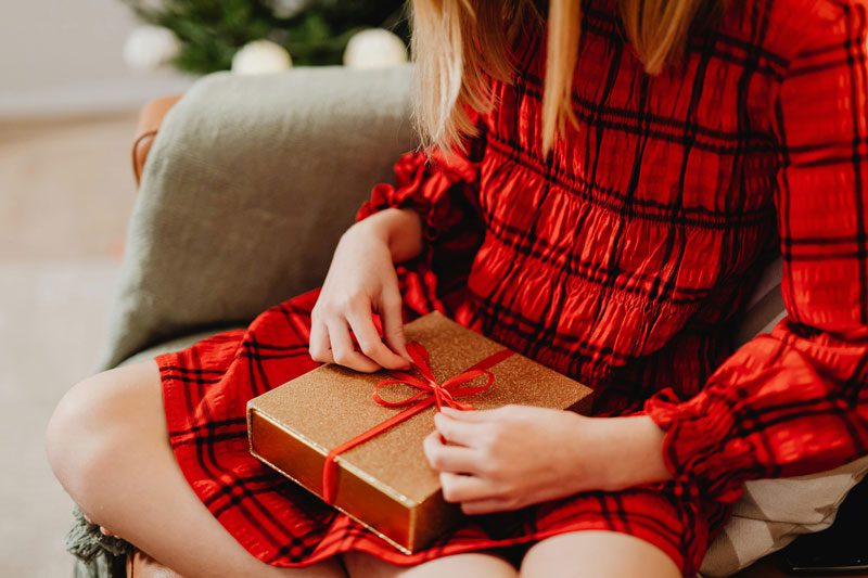 child opening gift